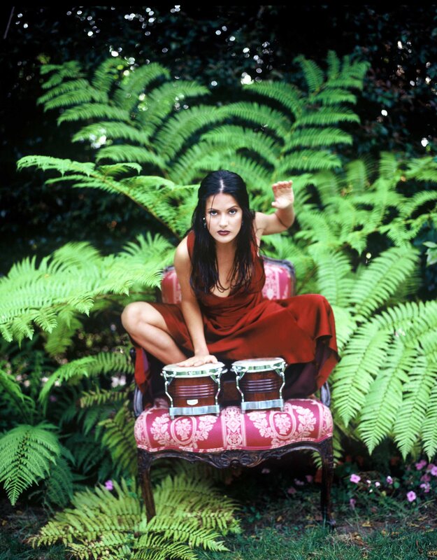Woman with bongos in garden