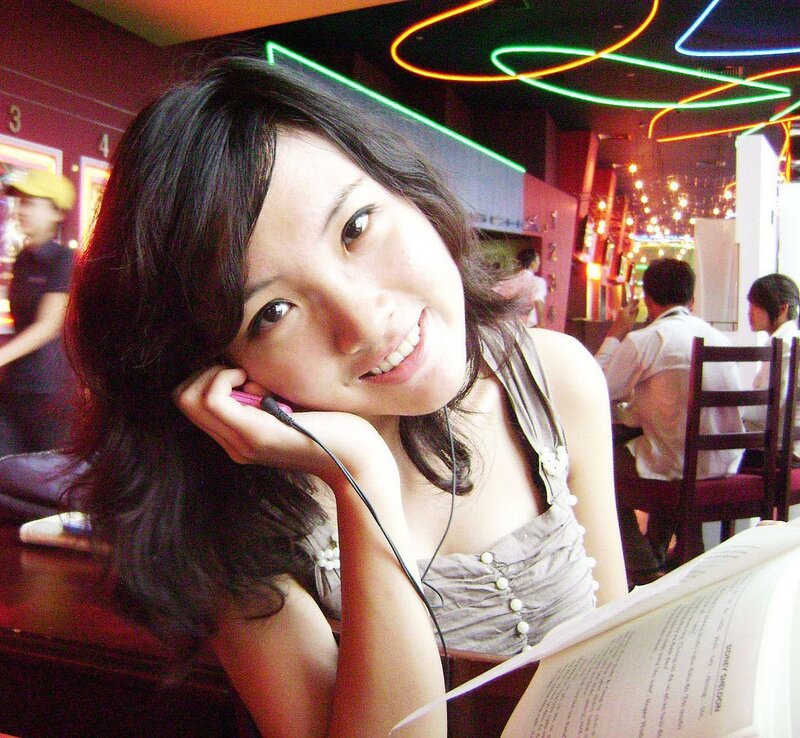 Woman with Book in Restaurant