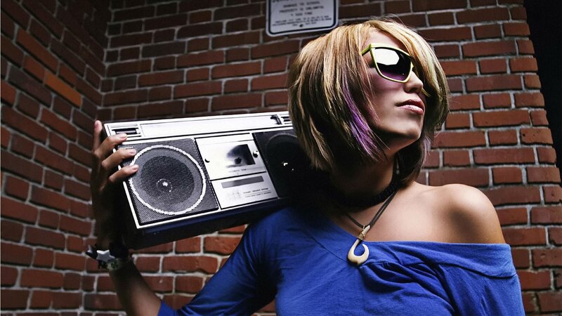 woman with boombox and sunglasses