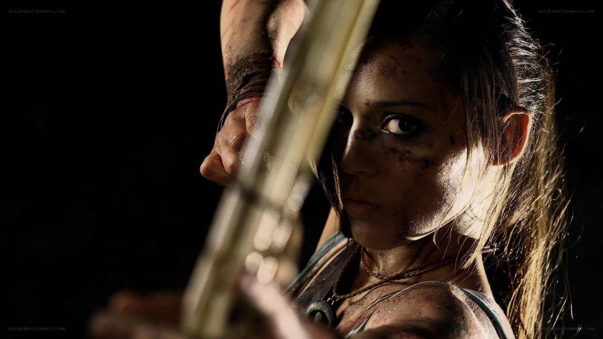 woman with bow and arrow