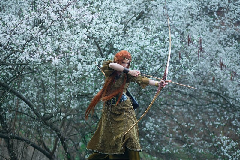 Woman with Bow and Arrow — Green, Dramatic, Spring, Photograph