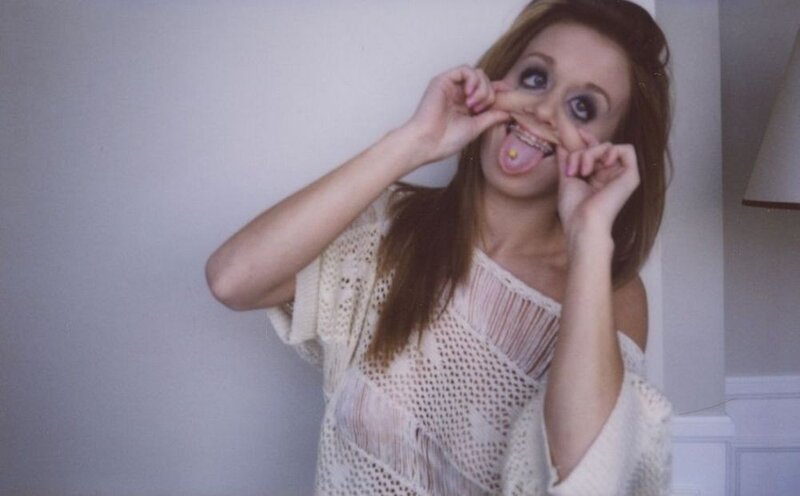 woman with braces and playful expression