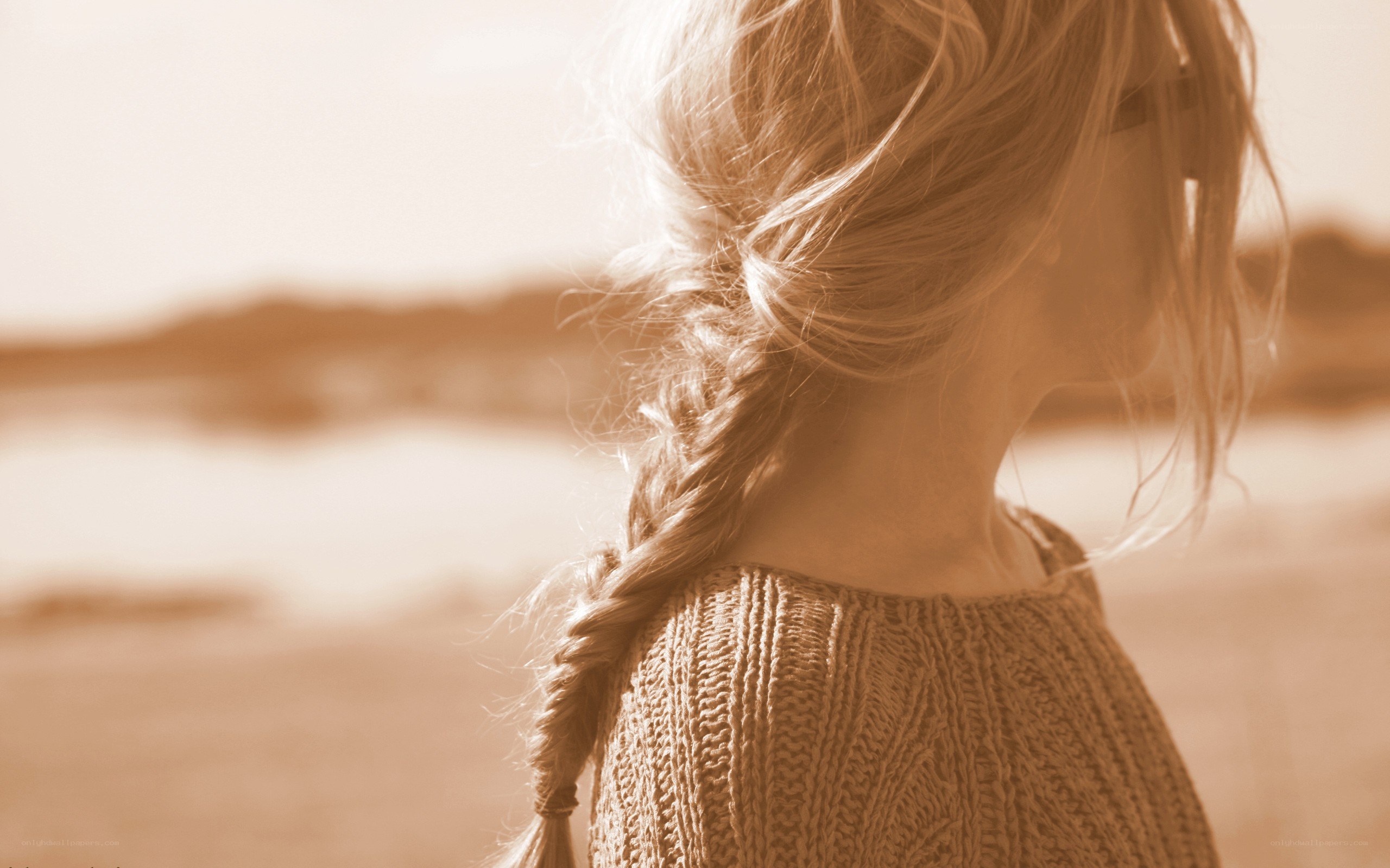 woman with braid at beach