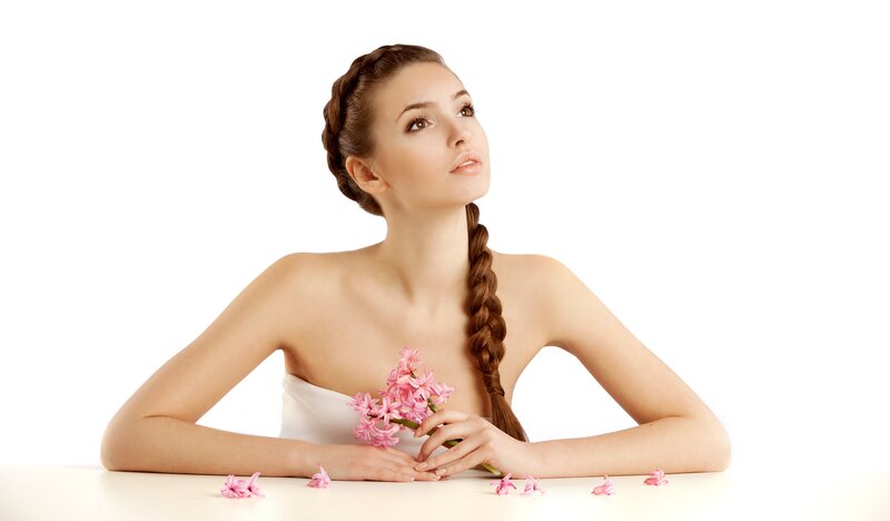 woman with braided hair and flowers