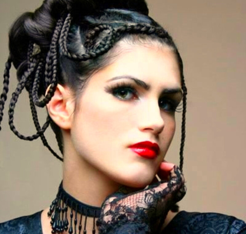 woman with braided hair and red lipstick