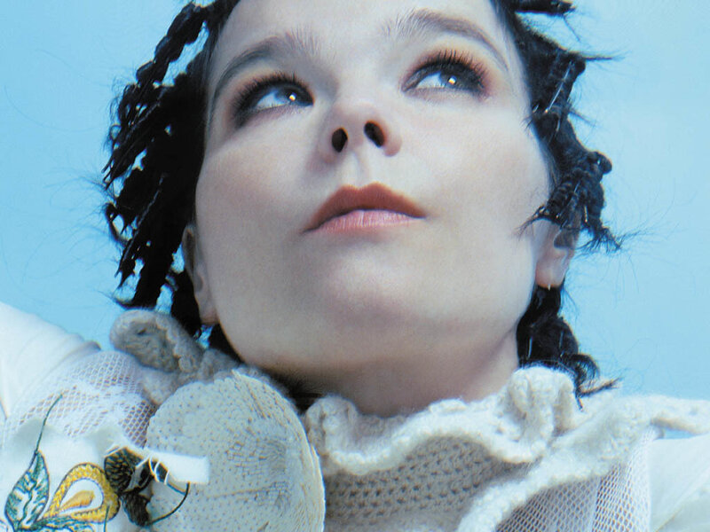 woman with braided hair looking up