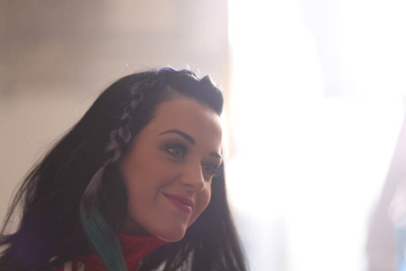woman with braided hair smiling