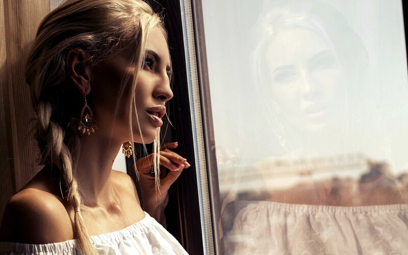 Woman with Braided Hair — White, Contemplative, Afternoon
