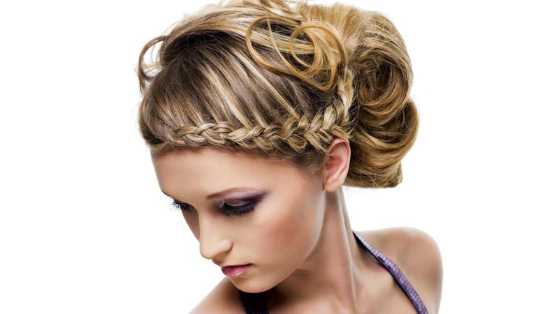 woman with braided updo hairstyle
