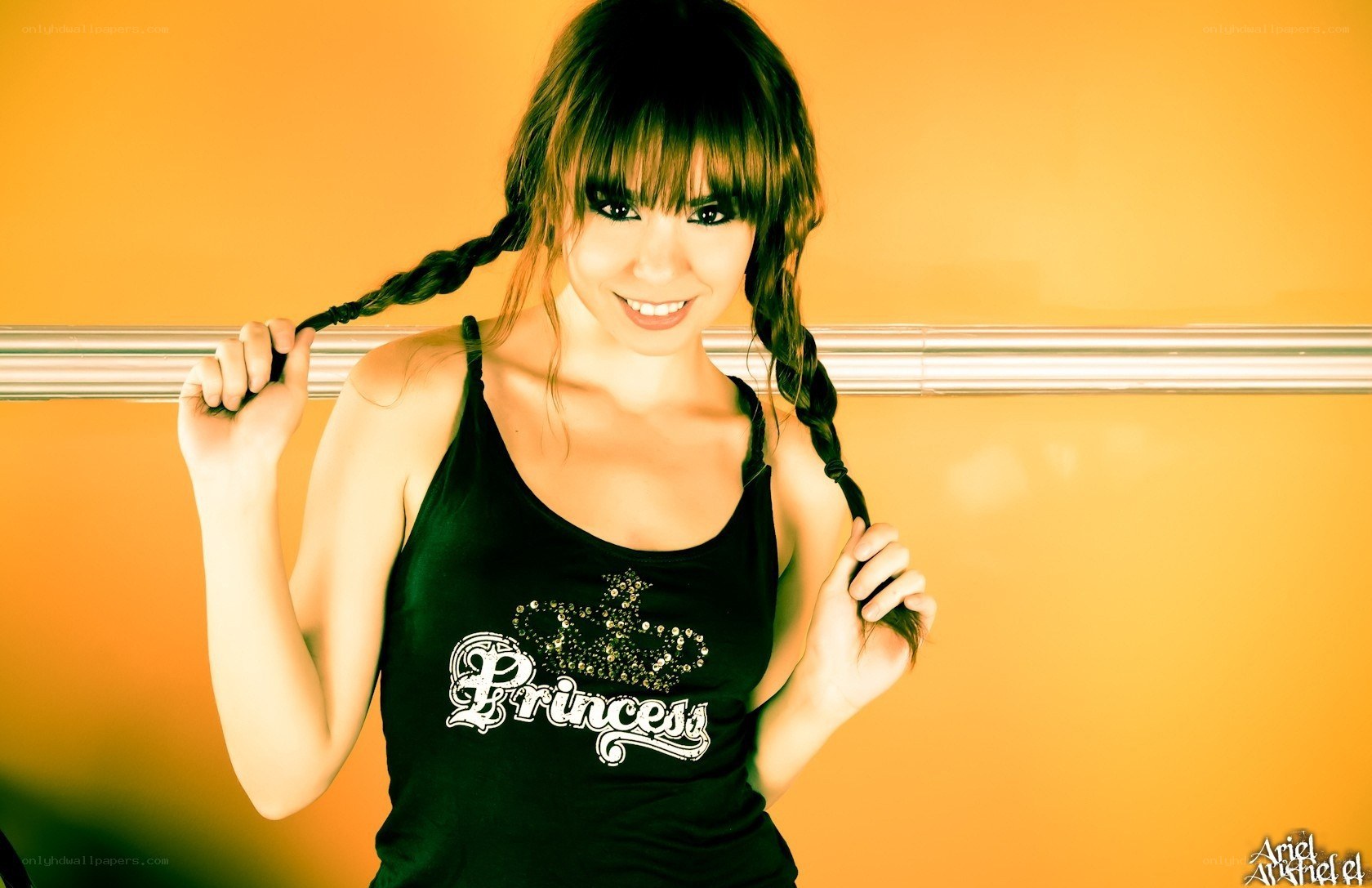 woman with braids smiling