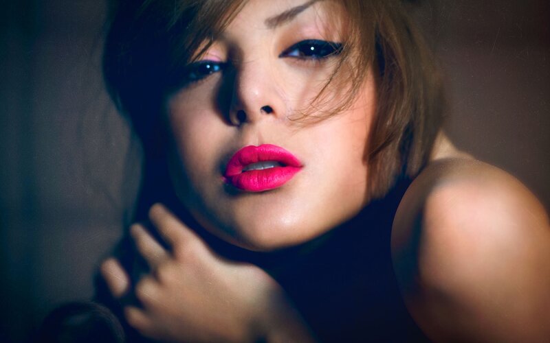 woman with bright pink lipstick