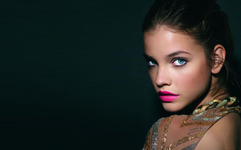 woman with bright pink lipstick