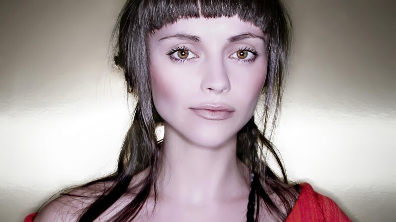 woman with brown eyes and bangs