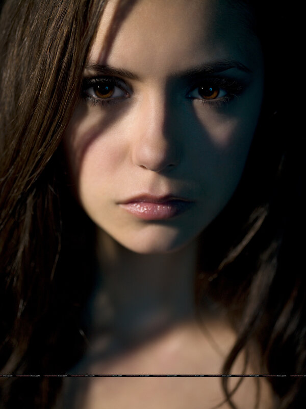 woman with brown eyes in shadow