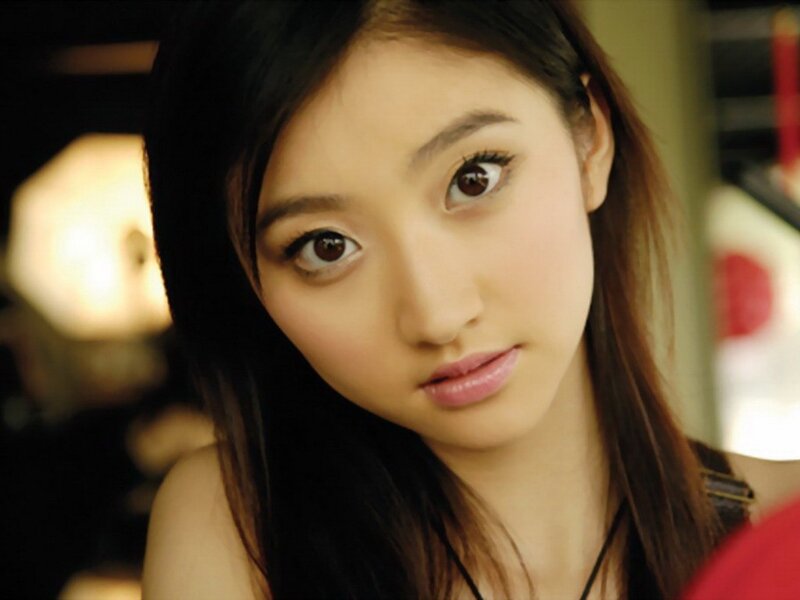 woman with brown eyes looking at camera