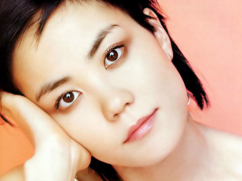 woman with brown eyes resting