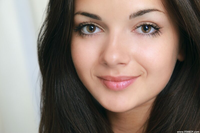 woman with brown eyes smiling