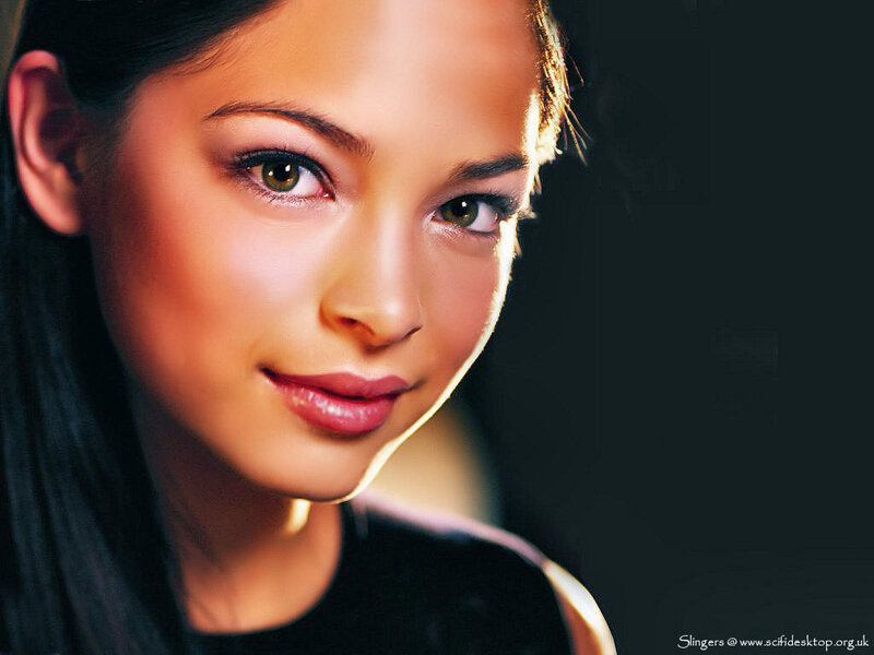 woman with brown eyes smiling