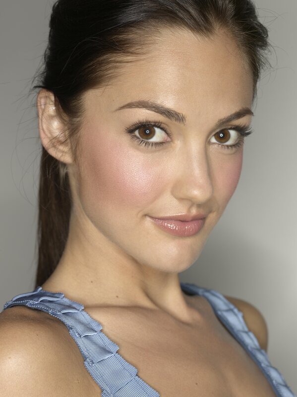 woman with brown eyes smiling