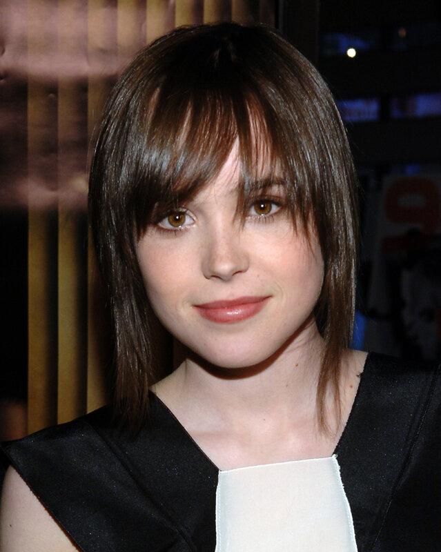 woman with brown hair and bangs