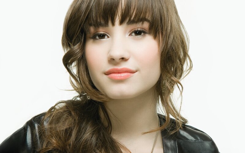woman with brown hair and bangs