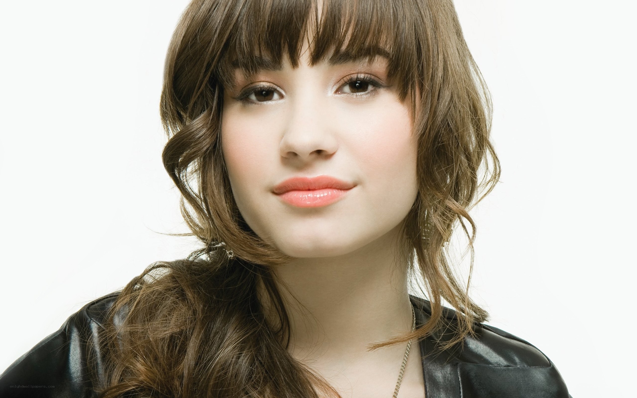 woman with brown hair and bangs