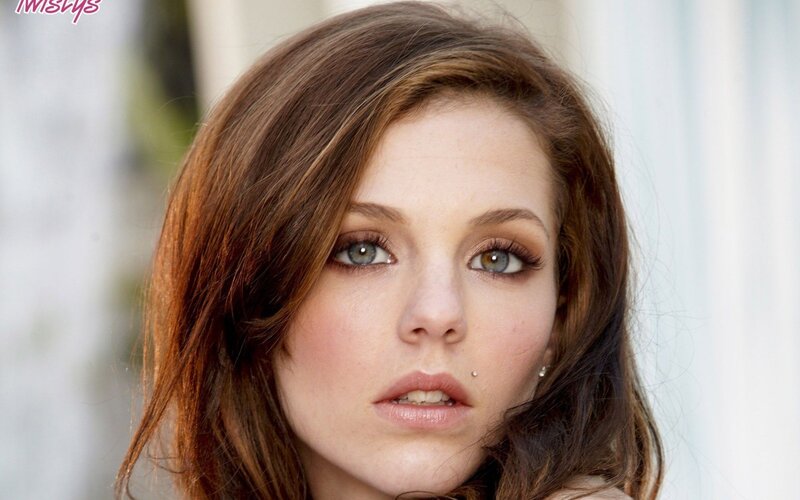 woman with brown hair and blue eyes