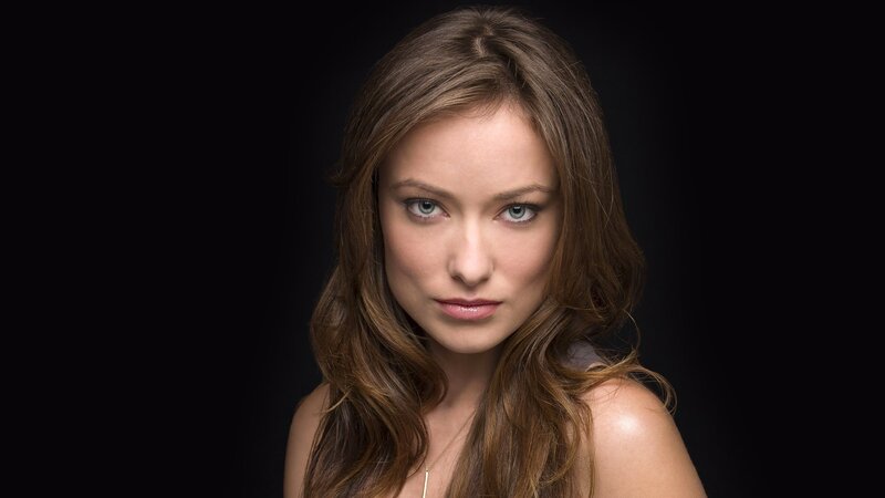 woman with brown hair and blue eyes