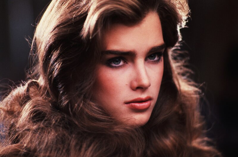 woman with brown hair and blue eyes