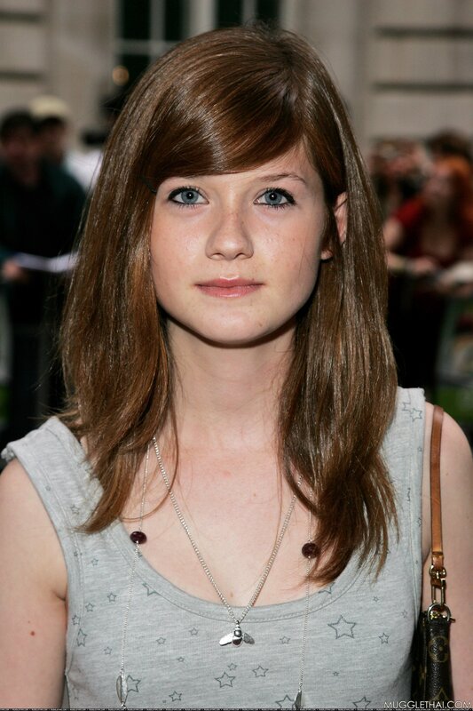 woman with brown hair and blue eyes