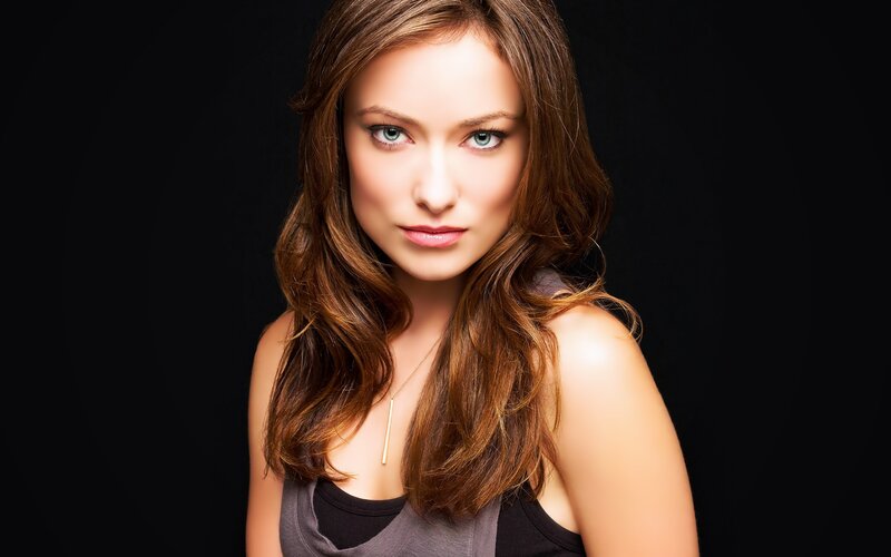 woman with brown hair and blue eyes