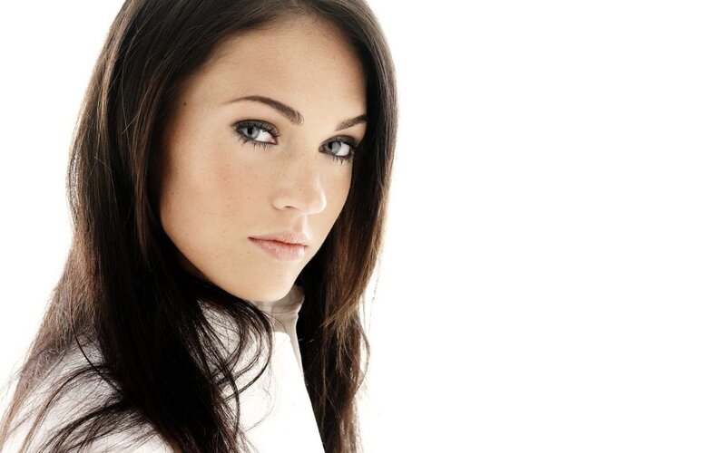 woman with brown hair and blue eyes
