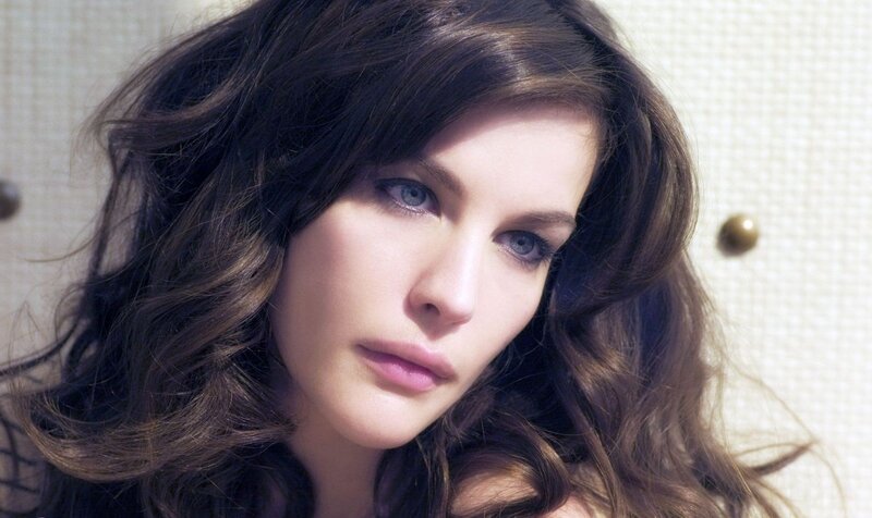 woman with brown hair and blue eyes