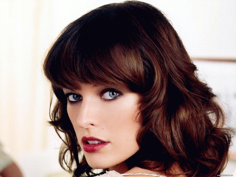 woman with brown hair and blue eyes