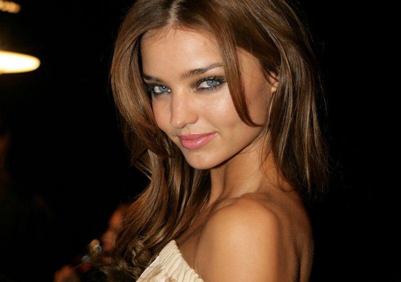 woman with brown hair and blue eyes