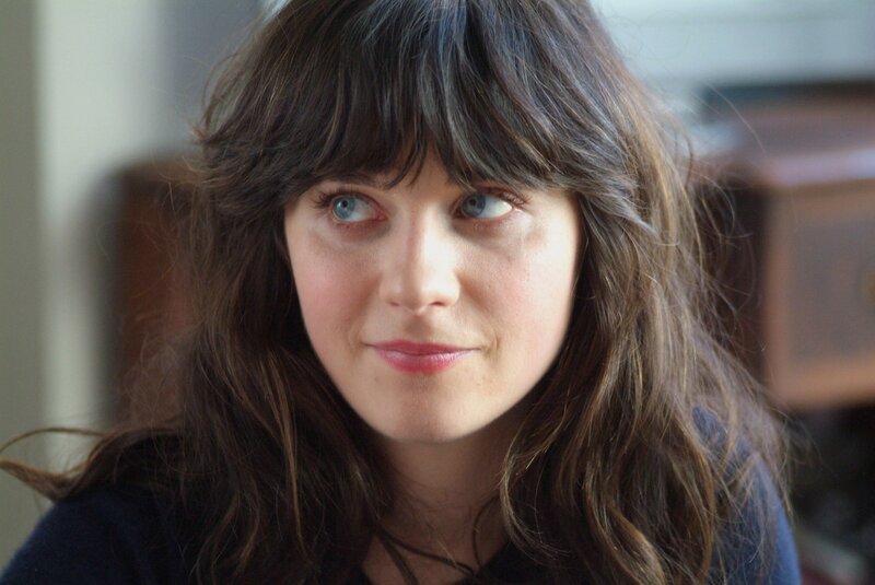 woman with brown hair and blue eyes