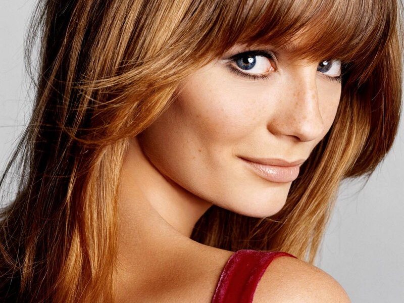 woman with brown hair and blue eyes