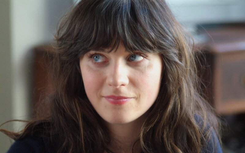 woman with brown hair and blue eyes