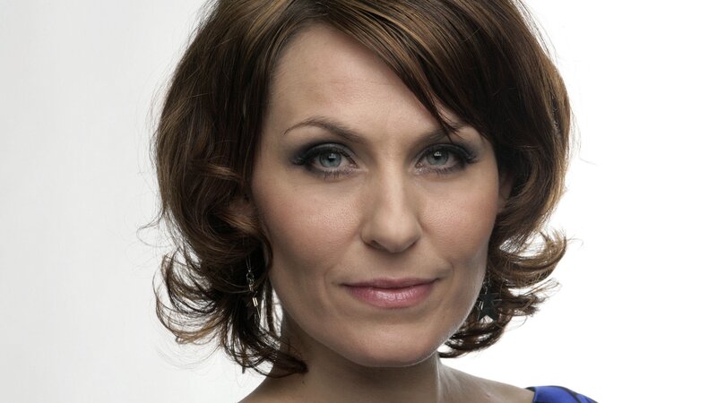 woman with brown hair and blue eyes