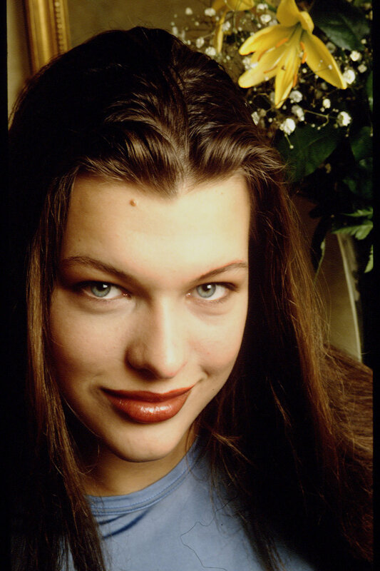 woman with brown hair and blue eyes