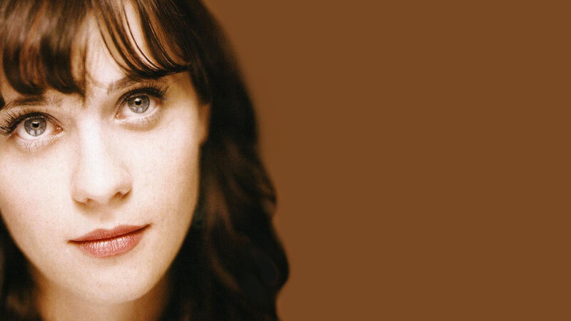 woman with brown hair and blue eyes