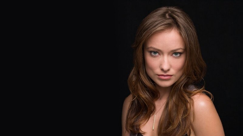 woman with brown hair and blue eyes