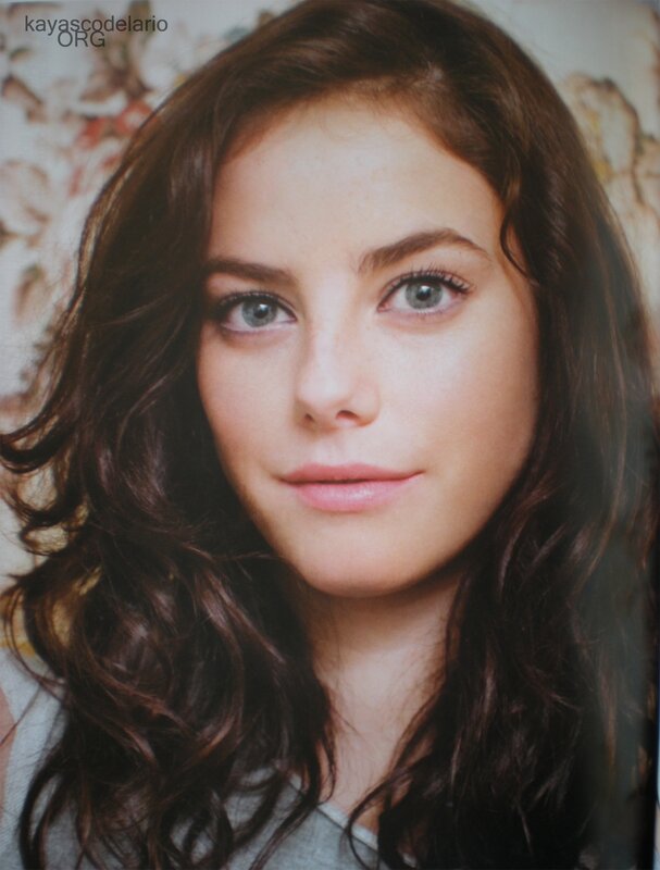 woman with brown hair and blue eyes