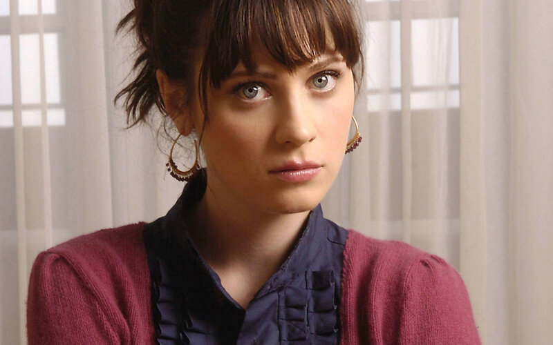 woman with brown hair and blue eyes