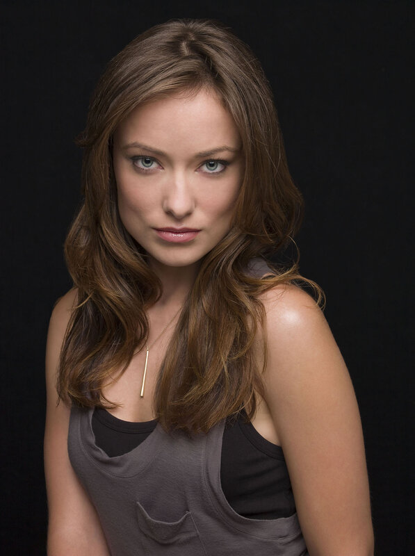 woman with brown hair and blue eyes