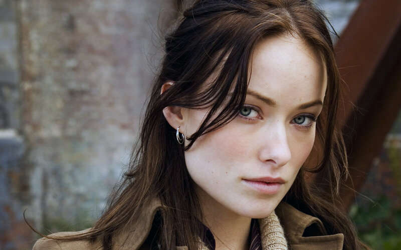 woman with brown hair and blue eyes