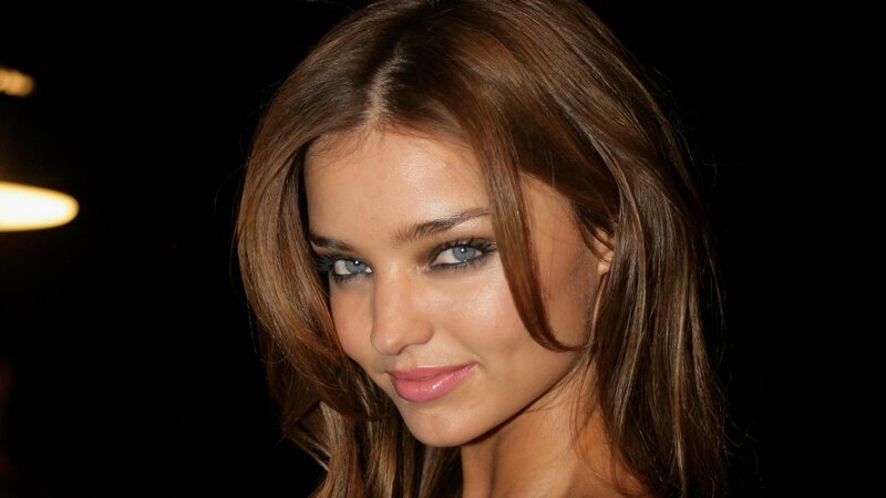 woman with brown hair and blue eyes