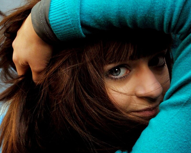 woman with brown hair and blue eyes