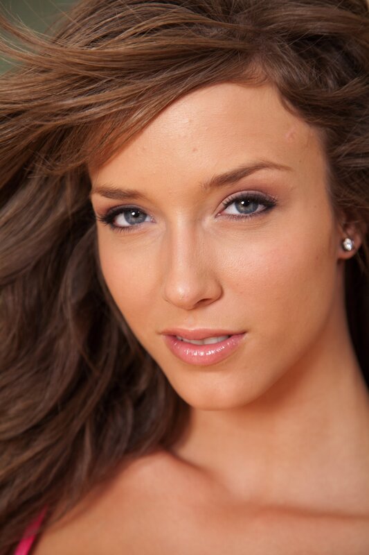 woman with brown hair and blue eyes