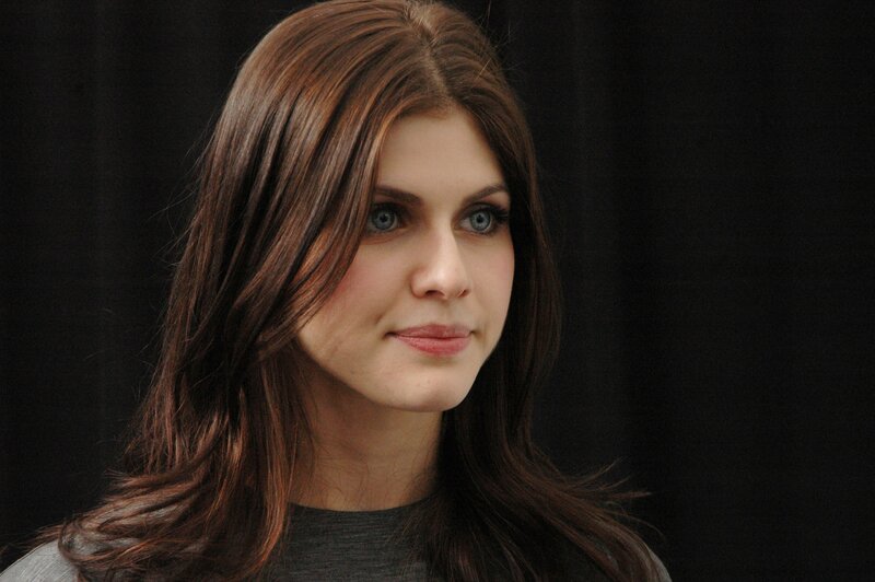 woman with brown hair and blue eyes